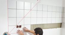 Как класть плитку на стену в ванной