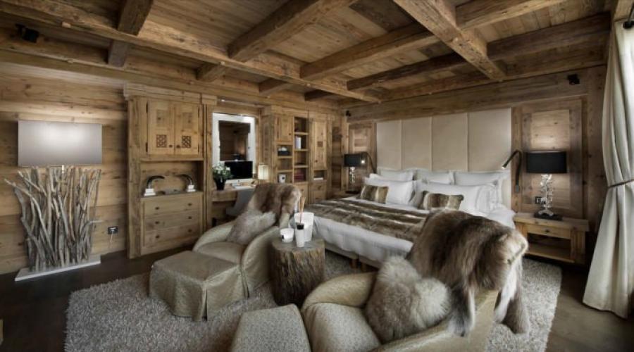 The best chalet style houses.  Country house in chalet style.  Cladding of the lower floor